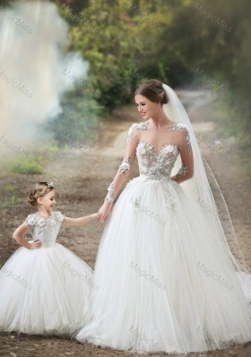 New Style See Through Long Sleeves Wedding Dresses with Appliques and Lovely Big Puffy Flower Girl Dress with Hand Made Flowers