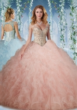 Unique Deep V Neck Peach Quinceanera Dress With Beading and Ruffles