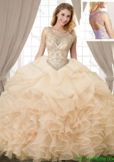 Beautiful Beaded Organza Champagne Quinceanera Dress with Ruffles and Pick Ups