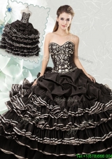 Luxurious Organza Black Quinceanera Dress with Ruffled Layers and Bubbles