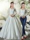 Long Sleeves Beading and Appliques Lace Up Wedding Gowns with White Brush Train