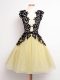 Sleeveless Tulle Knee Length Lace Up Bridesmaid Dress in Gold with Lace