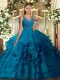 Blue Ball Gowns V-neck Sleeveless Fabric With Rolling Flowers Floor Length Backless Ruffles Quinceanera Gowns