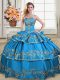 Blue Lace Up Ball Gown Prom Dress Embroidery and Ruffled Layers Sleeveless Floor Length