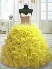 Romantic Sleeveless Organza Sweep Train Lace Up Sweet 16 Dress in Yellow for with Beading and Ruffles