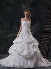 Eye-catching Sweetheart Sleeveless Wedding Dresses With Brush Train Beading and Appliques and Pick Ups White Taffeta