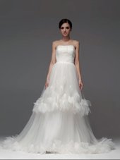 Sleeveless Tulle With Brush Train Lace Up Bridal Gown in White for with Ruffled Layers and Ruching