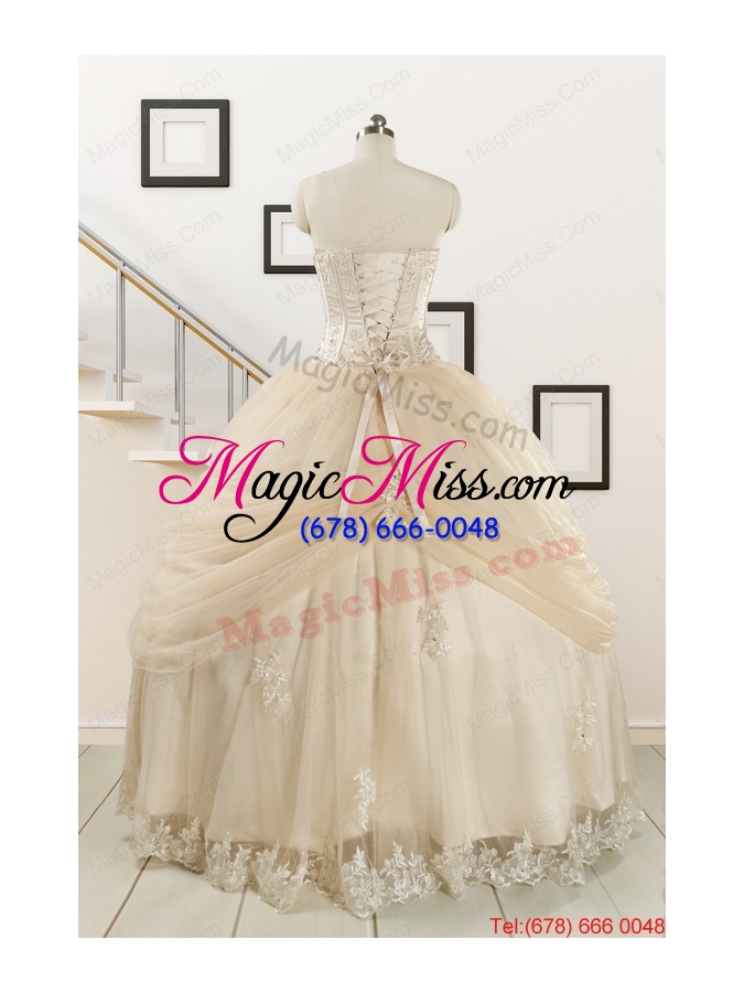 wholesale 2015 classical appliques and hand made flower quinceanera dresses in champagne