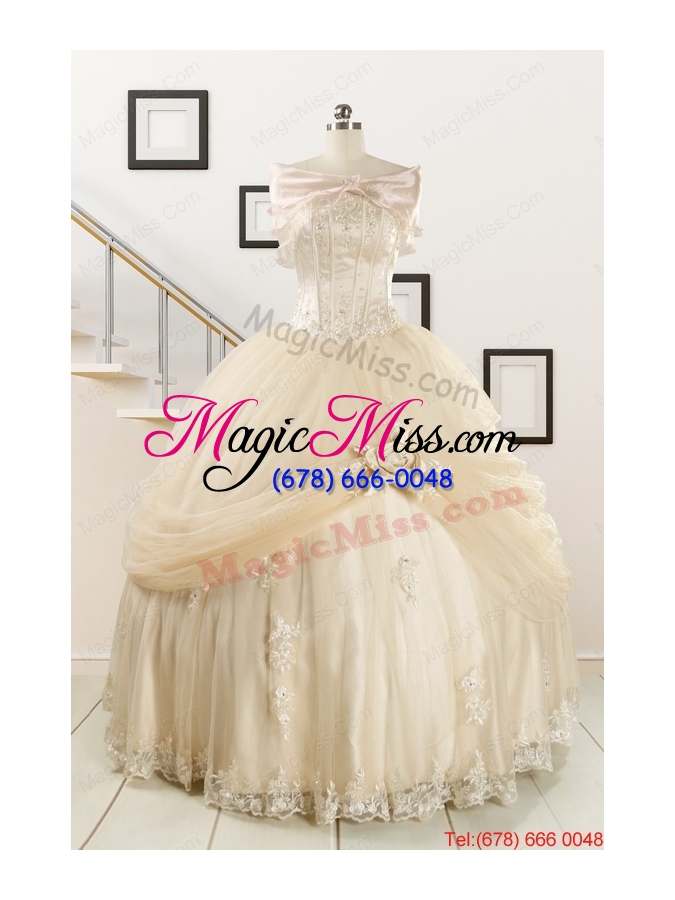 wholesale 2015 classical appliques and hand made flower quinceanera dresses in champagne