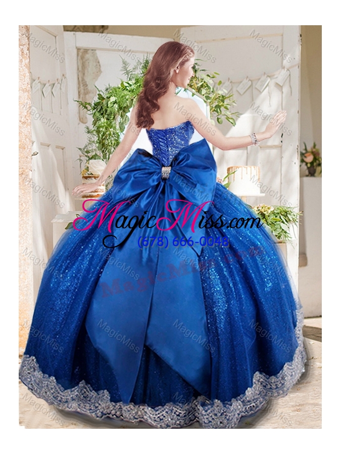 wholesale wonderful beaded and applique big puffy sweet fifteen dress with bowknot