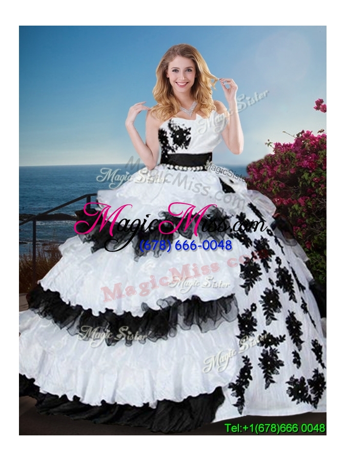 wholesale fashionable black and white quinceanera dress with appliques and ruffled layers