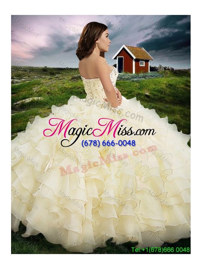 wholesale western style popular organza light yellow quinceanera dress with beading and ruffled layers