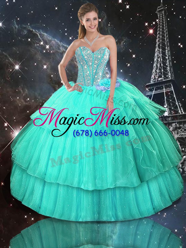 wholesale sleeveless organza floor length lace up quinceanera dress in turquoise with ruffled layers and sequins