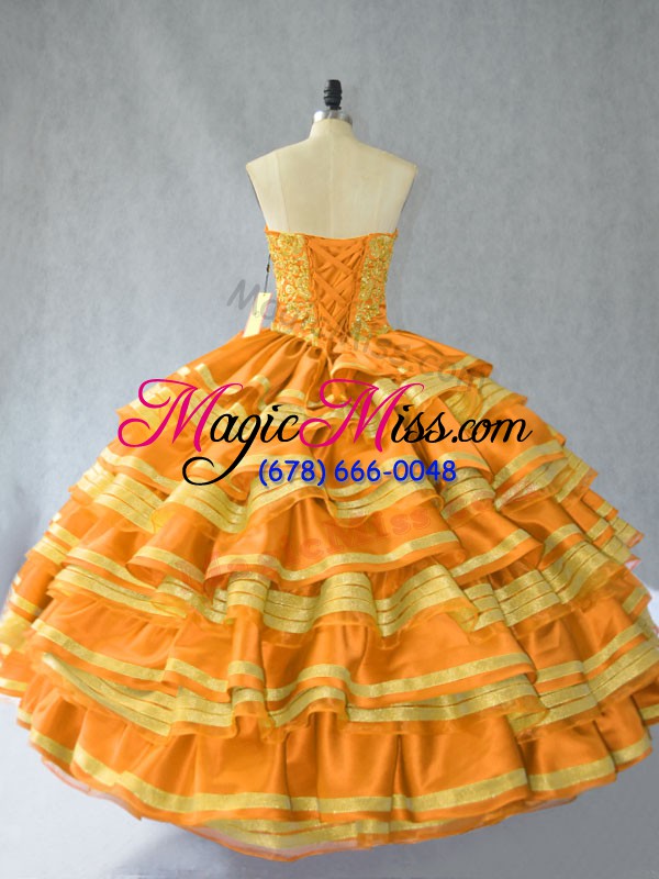 wholesale amazing sleeveless organza floor length lace up quince ball gowns in gold with embroidery and ruffled layers