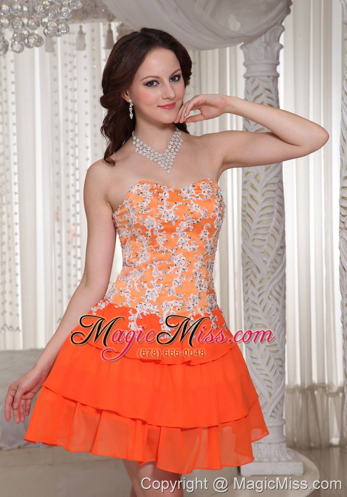 wholesale appliques decorate orange sweetheart lace-up prom dress with mini-length