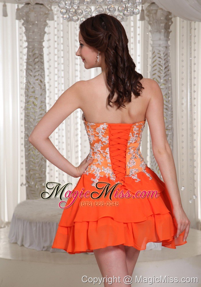 wholesale appliques decorate orange sweetheart lace-up prom dress with mini-length