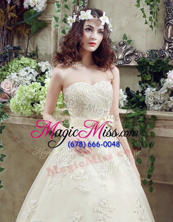 wholesale decent champagne a-line tulle sweetheart sleeveless lace and appliques and bowknot lace up wedding gowns court train